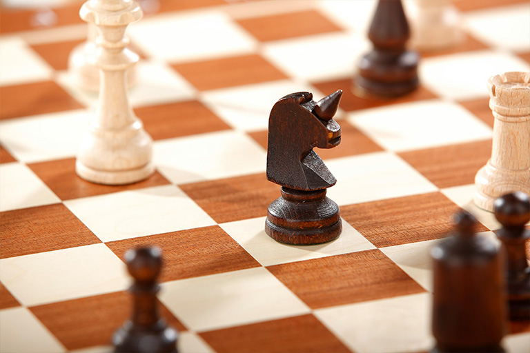 Chess pieces on a board